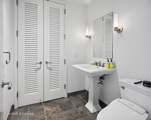 401 N Wabash Ave Unit 30E, Chicago, IL 60611 - half bath with a closet and stone finish floors
