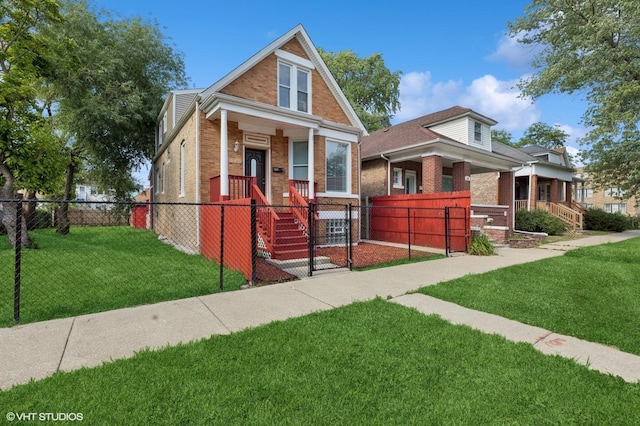 642 E 90th St, Chicago, IL 60619 - view of front of home featuring brick siding, a fenced front yard, a gate, and a porch