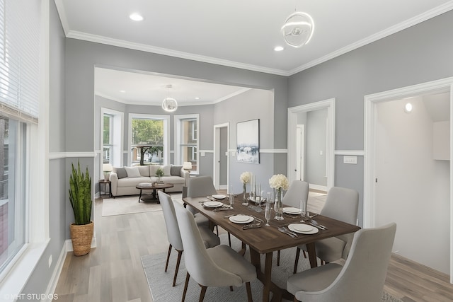 642 E 90th St, Chicago, IL 60619 - dining space featuring light wood-type flooring, recessed lighting, and crown molding