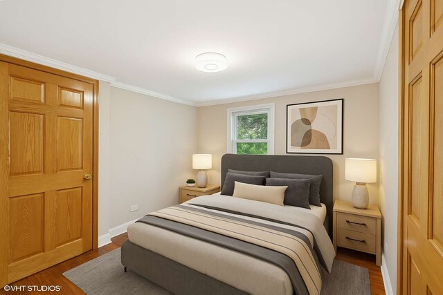 642 E 90th St, Chicago, IL 60619 - bedroom with wood finished floors and crown molding