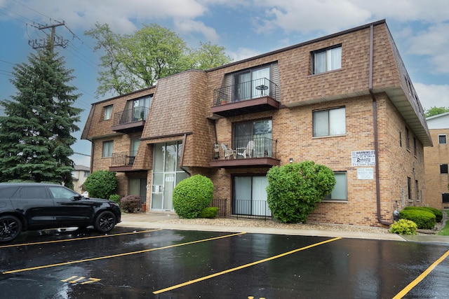 4833 W 109th St Unit 103, Oak Lawn, IL 60453 - view of building exterior with uncovered parking