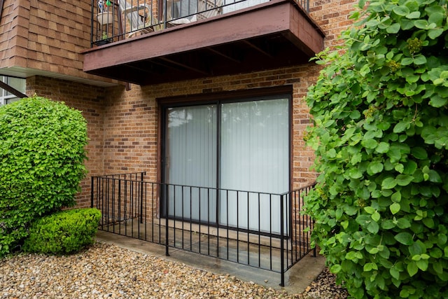 4833 W 109th St Unit 103, Oak Lawn, IL 60453 - entrance to property featuring a balcony and brick siding