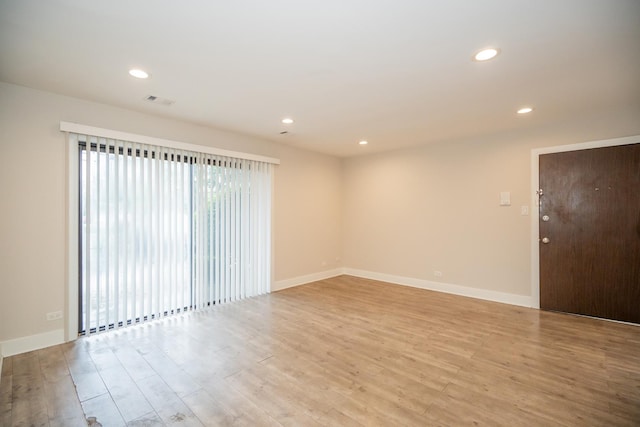4833 W 109th St Unit 103, Oak Lawn, IL 60453 - empty room with light wood-style floors and recessed lighting