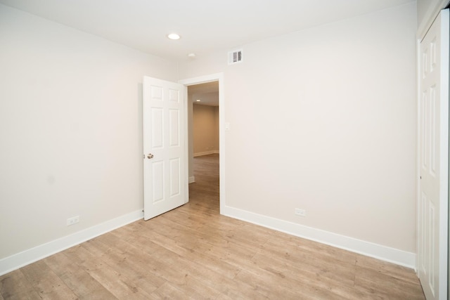 4833 W 109th St Unit 103, Oak Lawn, IL 60453 - unfurnished bedroom with recessed lighting, light wood-style floors, and a closet