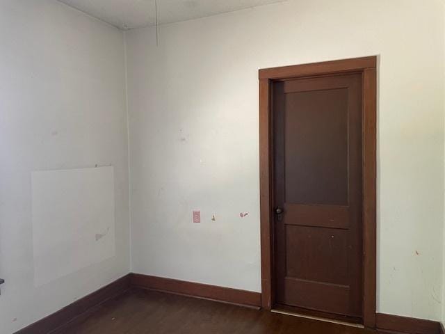1322 N Prairie Ave, Joliet, IL 60435 - empty room featuring baseboards and dark wood finished floors