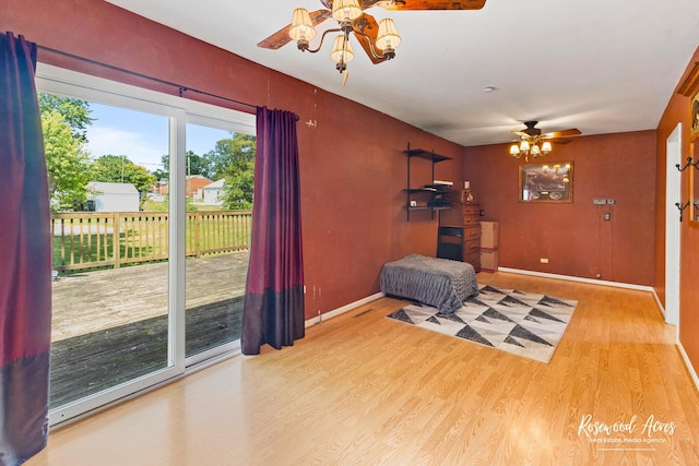 409 E Main St, Peotone, IL 60468 - unfurnished living room featuring ceiling fan and wood finished floors