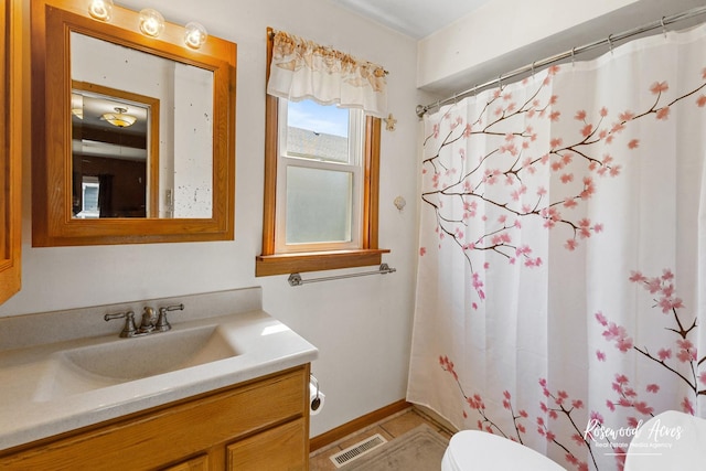 409 E Main St, Peotone, IL 60468 - bathroom featuring vanity and a shower with shower curtain