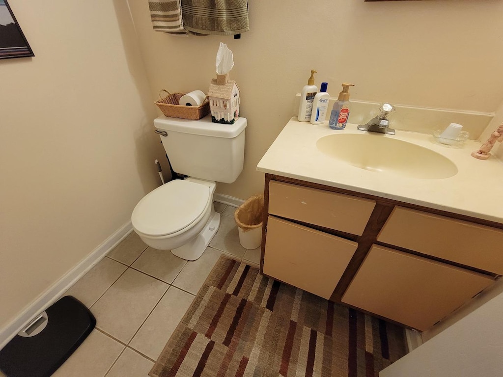 531 E Ave, Streamwood, IL 60107 - half bathroom featuring tile patterned flooring and vanity