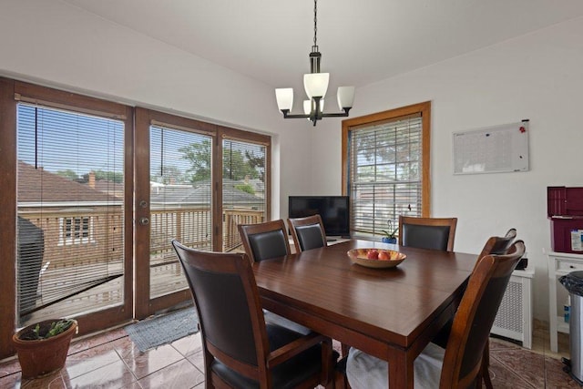 1619 S 61st Ave, Cicero, IL 60804 - tiled dining room featuring healthy amount of natural light and a chandelier