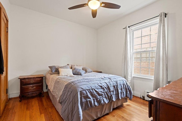 1619 S 61st Ave, Cicero, IL 60804 - bedroom featuring wood finished floors, multiple windows, and a ceiling fan
