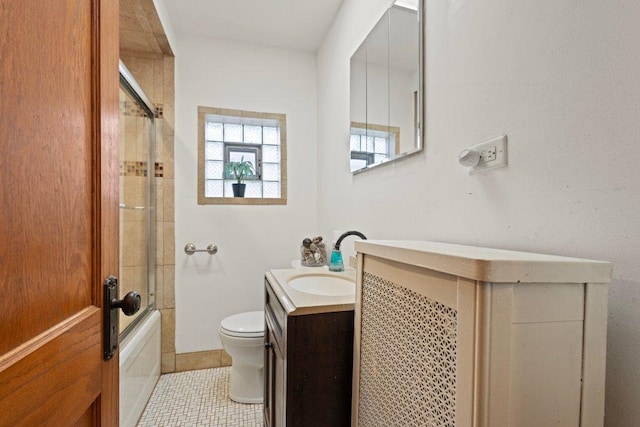 1619 S 61st Ave, Cicero, IL 60804 - bathroom featuring vanity, shower / bath combination with glass door, and tile patterned floors