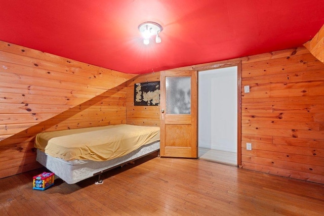 1619 S 61st Ave, Cicero, IL 60804 - bedroom with wooden walls and hardwood / wood-style flooring