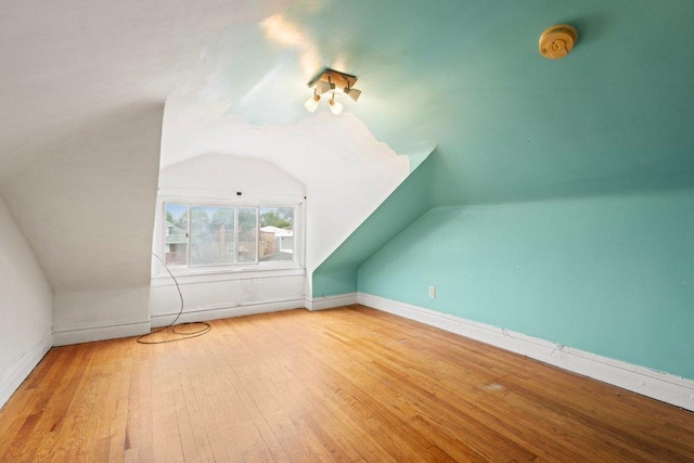 1619 S 61st Ave, Cicero, IL 60804 - additional living space featuring vaulted ceiling and wood finished floors