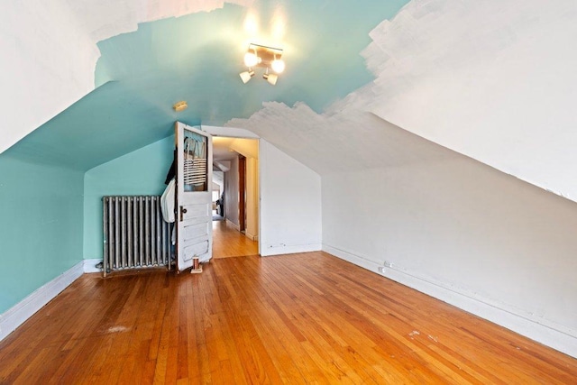 1619 S 61st Ave, Cicero, IL 60804 - bonus room with radiator, hardwood / wood-style flooring, and lofted ceiling