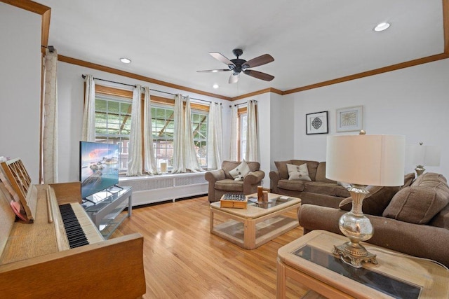 1619 S 61st Ave, Cicero, IL 60804 - living area with ornamental molding, a ceiling fan, light wood-type flooring, radiator heating unit, and recessed lighting