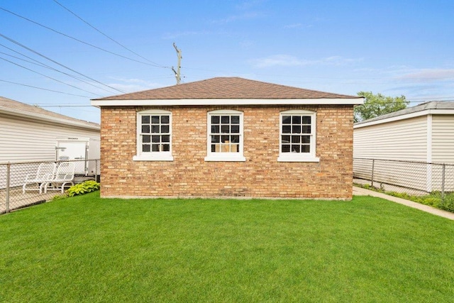 1619 S 61st Ave, Cicero, IL 60804 - rear view of property with brick siding and a shingled roof