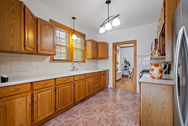 1619 S 61st Ave, Cicero, IL 60804 - kitchen with brown cabinetry and light countertops