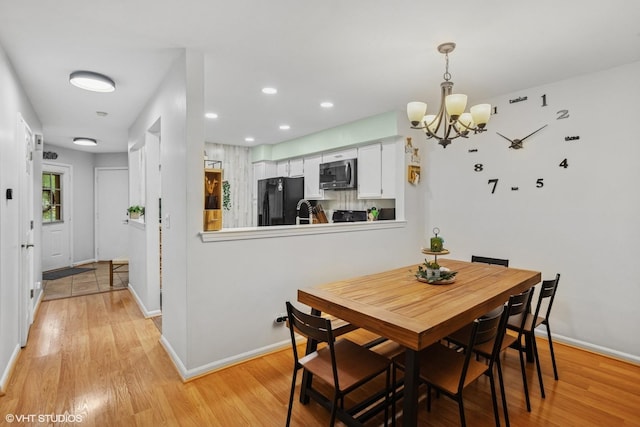 1039 Talbots Ln, Elk Grove Village, IL 60007 - dining space featuring a chandelier, light wood finished floors, and recessed lighting