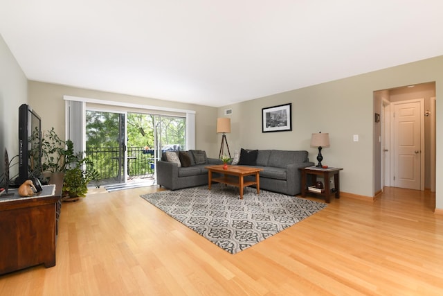 5400 Carriageway Dr Unit 315, Rolling Meadows, IL 60008 - living room with light wood-style floors