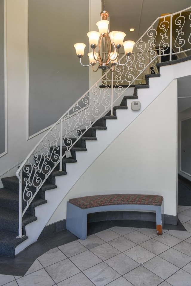 5400 Carriageway Dr Unit 315, Rolling Meadows, IL 60008 - stairway featuring tile patterned flooring, recessed lighting, and a chandelier