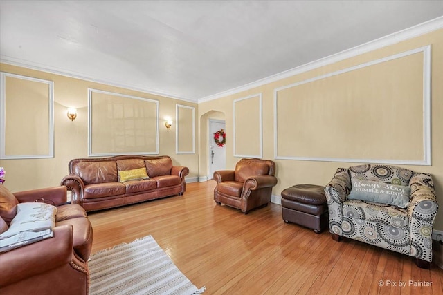 6121 N Hoyne Ave Unit 1S, Chicago, IL 60659 - living area with arched walkways, wood finished floors, and ornamental molding