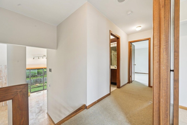 397 Briarwood Ct, Gurnee, IL 60031 - hallway featuring light carpet and rail lighting