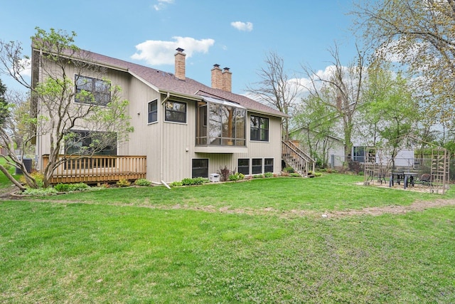 397 Briarwood Ct, Gurnee, IL 60031 - back of property with a chimney, stairway, a wooden deck, and roof with shingles