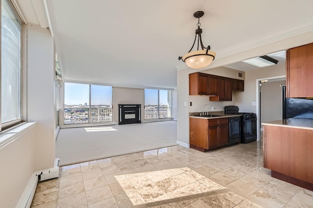 20 N Tower Rd Unit 12M, Oak Brook, IL 60523 - kitchen with black appliances, light countertops, open floor plan, hanging light fixtures, and brown cabinetry