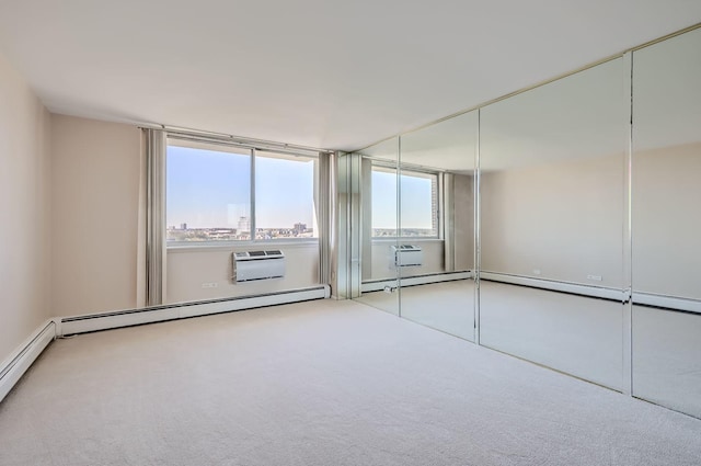 20 N Tower Rd Unit 12M, Oak Brook, IL 60523 - carpeted spare room featuring a baseboard radiator