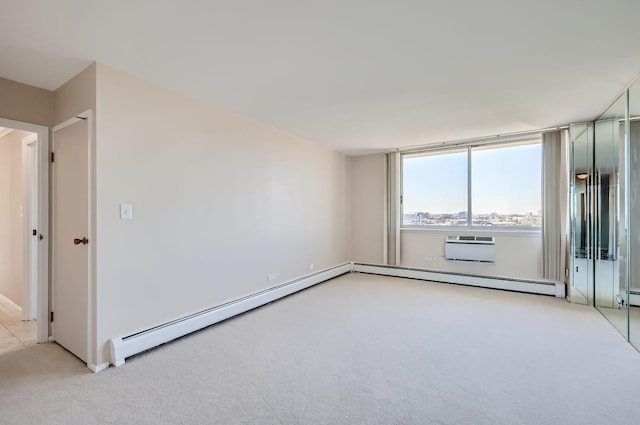 20 N Tower Rd Unit 12M, Oak Brook, IL 60523 - spare room with light carpet and baseboard heating