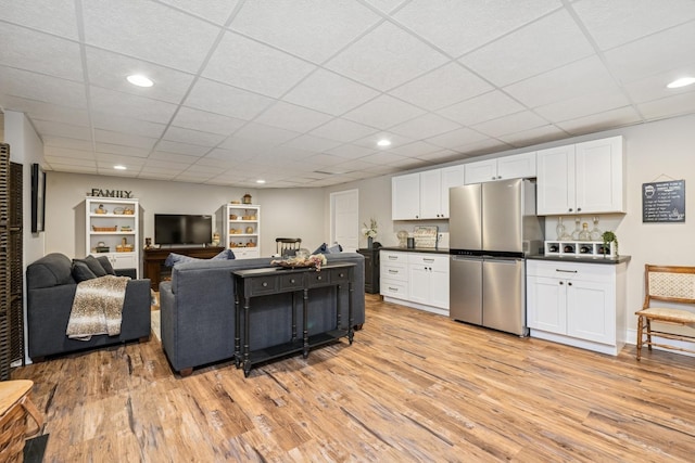 5803 Tomlinson Dr, Mchenry, IL 60050 - kitchen featuring freestanding refrigerator, light wood-type flooring, white cabinets, a paneled ceiling, and recessed lighting