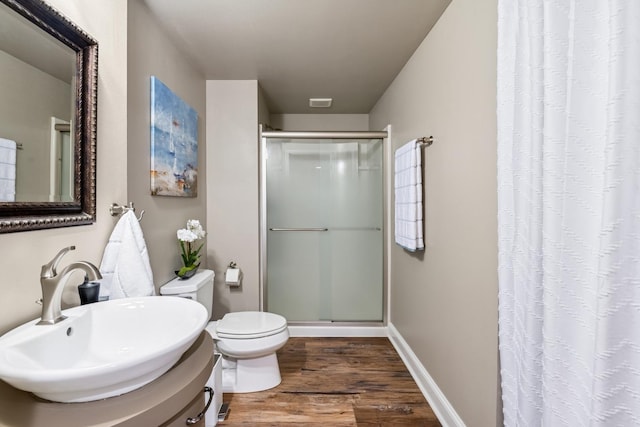 5803 Tomlinson Dr, Mchenry, IL 60050 - bathroom with a shower with curtain and wood finished floors