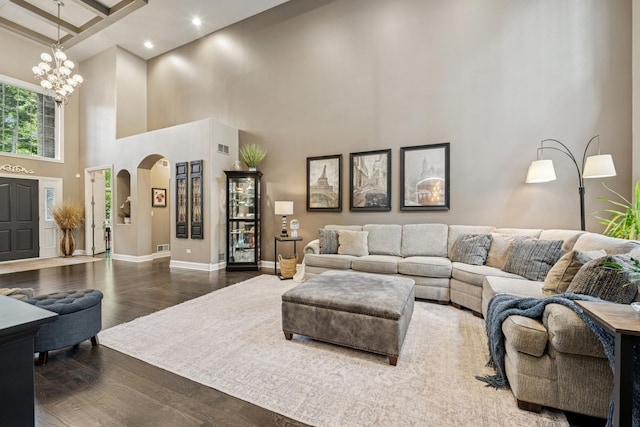 5803 Tomlinson Dr, Mchenry, IL 60050 - living room featuring a high ceiling, arched walkways, dark wood finished floors, a chandelier, and recessed lighting