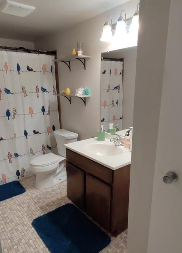100 W Park Circle Dr Unit 1C, Wheaton, IL 60187 - full bathroom featuring vanity, tile patterned flooring, and a shower with shower curtain