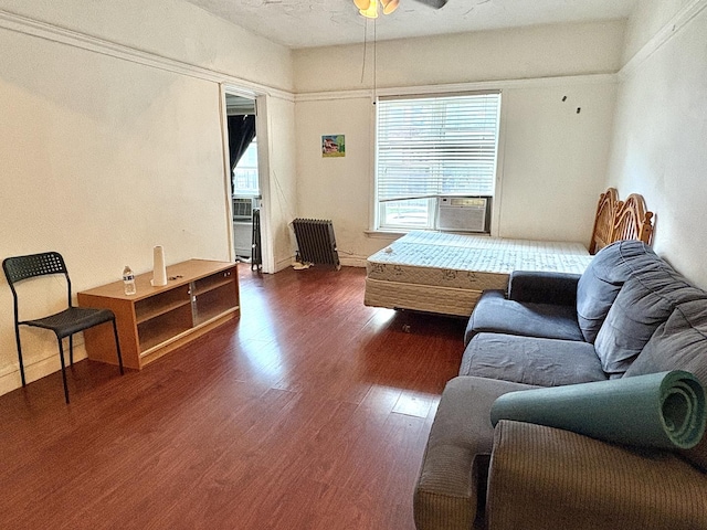 6103 S Ingleside Ave Unit 1, Chicago, IL 60637 - bedroom featuring radiator heating unit, dark wood-type flooring, and cooling unit