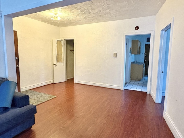 6103 S Ingleside Ave Unit 1, Chicago, IL 60637 - unfurnished living room with wood finished floors and baseboards