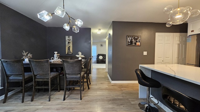 16 Forest Ln, Cary, IL 60013 - dining room with light wood finished floors and baseboards