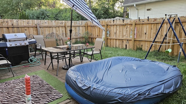 16 Forest Ln, Cary, IL 60013 - fenced backyard featuring outdoor dining space and a patio area