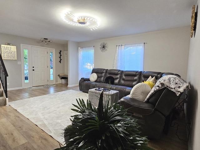 16 Forest Ln, Cary, IL 60013 - living room featuring plenty of natural light, light wood-type flooring, and stairway