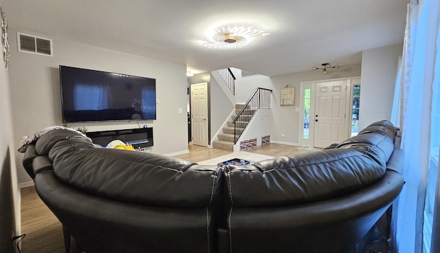 16 Forest Ln, Cary, IL 60013 - living area featuring wood finished floors and stairway