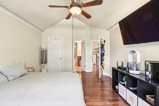 145 Benton Ln, Bloomingdale, IL 60108 - bedroom featuring crown molding, dark wood-style flooring, vaulted ceiling, and ceiling fan