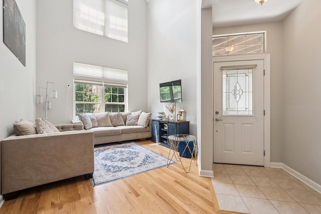 8471 Callie Ave, Morton Grove, IL 60053 - entrance foyer with a towering ceiling and light wood finished floors