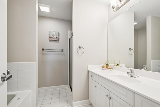 8471 Callie Ave, Morton Grove, IL 60053 - full bathroom with vanity, a garden tub, tile patterned flooring, and a shower