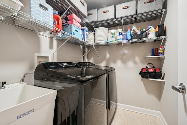 8471 Callie Ave, Morton Grove, IL 60053 - laundry area with washer and dryer and baseboards