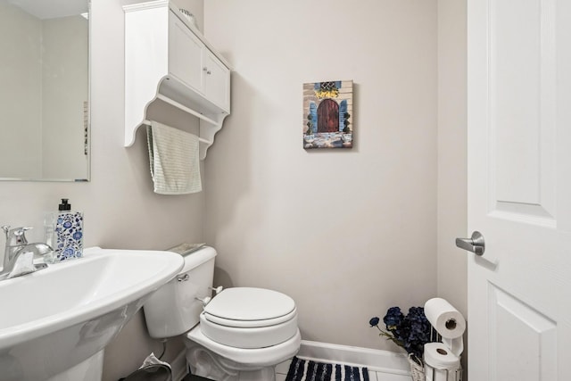 8471 Callie Ave, Morton Grove, IL 60053 - bathroom featuring toilet and baseboards