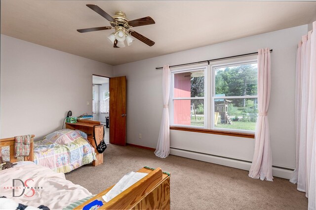 927 Clark St, Marseilles, IL 61341 - carpeted bedroom featuring baseboard heating and ceiling fan