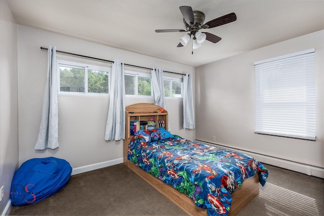 927 Clark St, Marseilles, IL 61341 - carpeted bedroom with multiple windows, a baseboard radiator, and ceiling fan