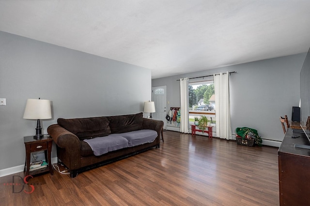 927 Clark St, Marseilles, IL 61341 - living area with wood finished floors and a baseboard radiator