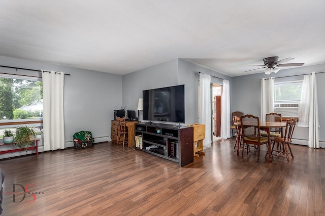 927 Clark St, Marseilles, IL 61341 - living room with cooling unit, wood finished floors, ceiling fan, and baseboard heating