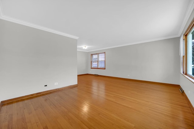 2621 Ridge Rd, Lansing, IL 60438 - unfurnished room with light wood-style floors and crown molding